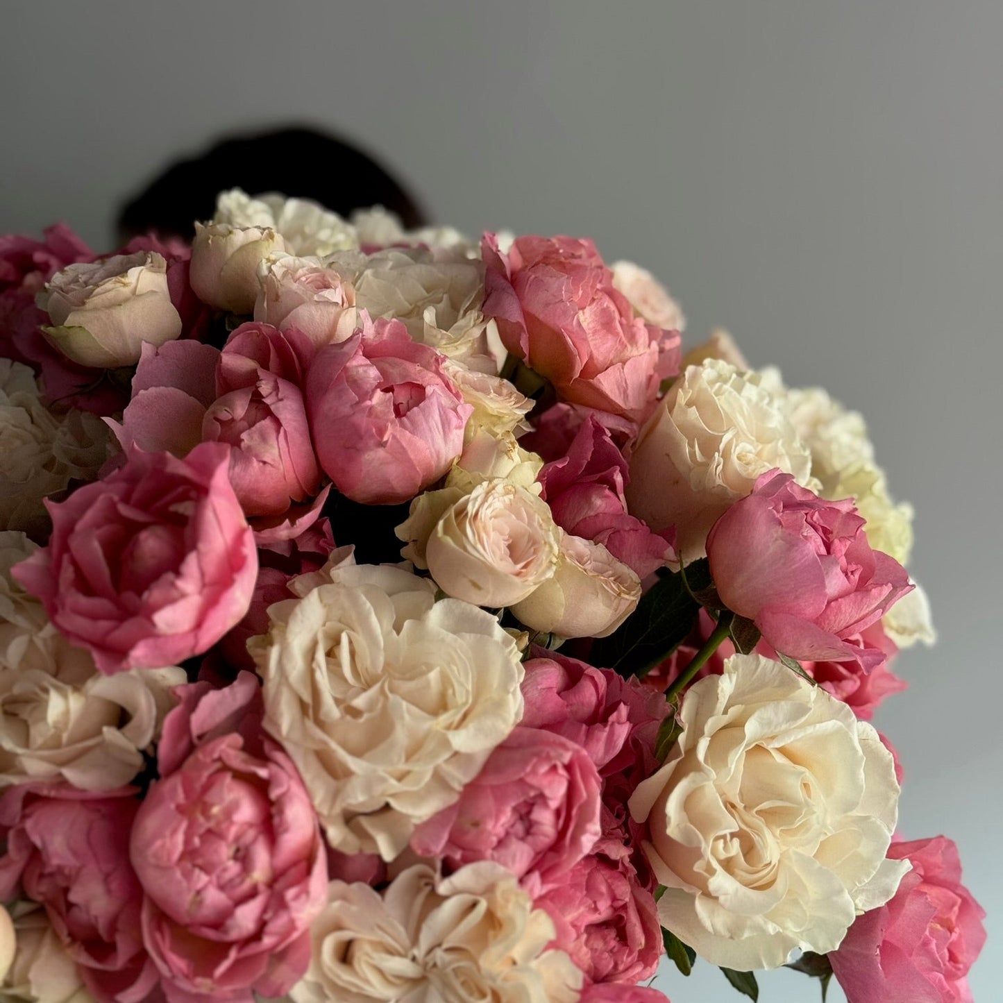 Bouquet of pink and white flowers with a blurred background
