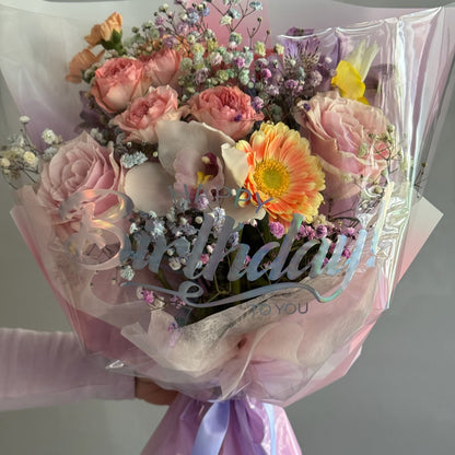 Happy Birthday colorful bouquet on grey background 