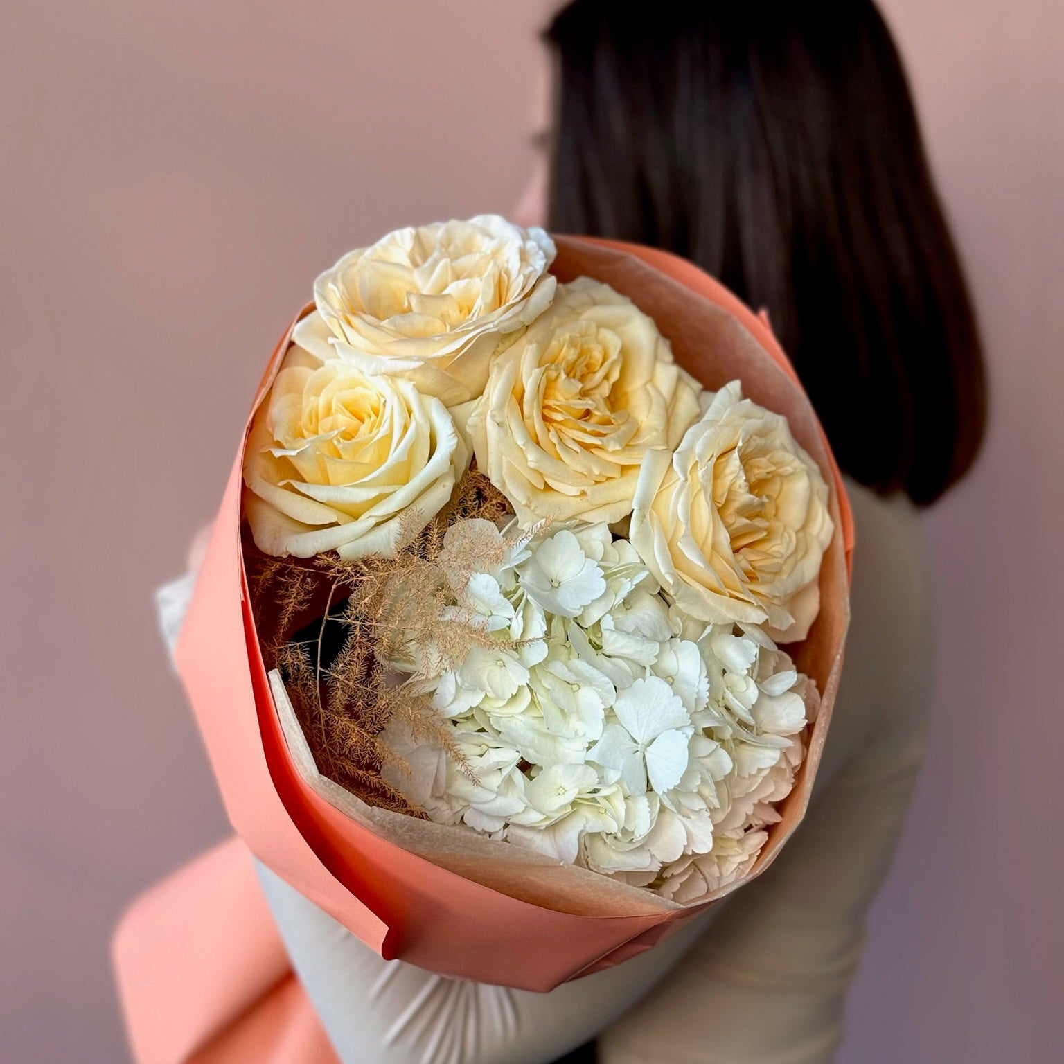 Bouquet of white roses with a blurred background