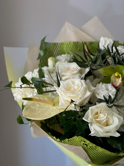 Closeup of bouquet with withe and green flowers